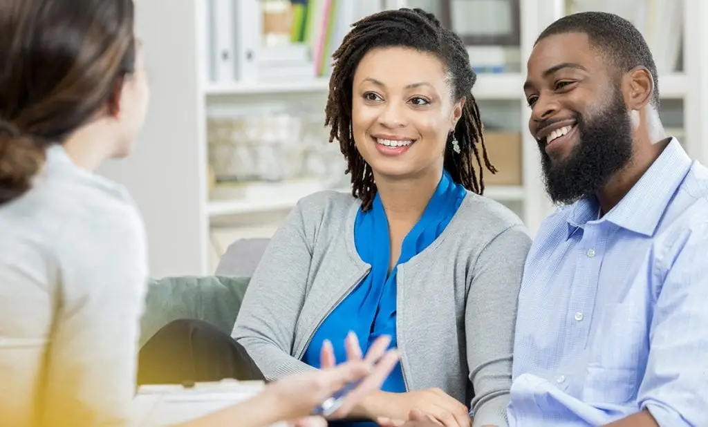 Couple counsels with physician on infertility
