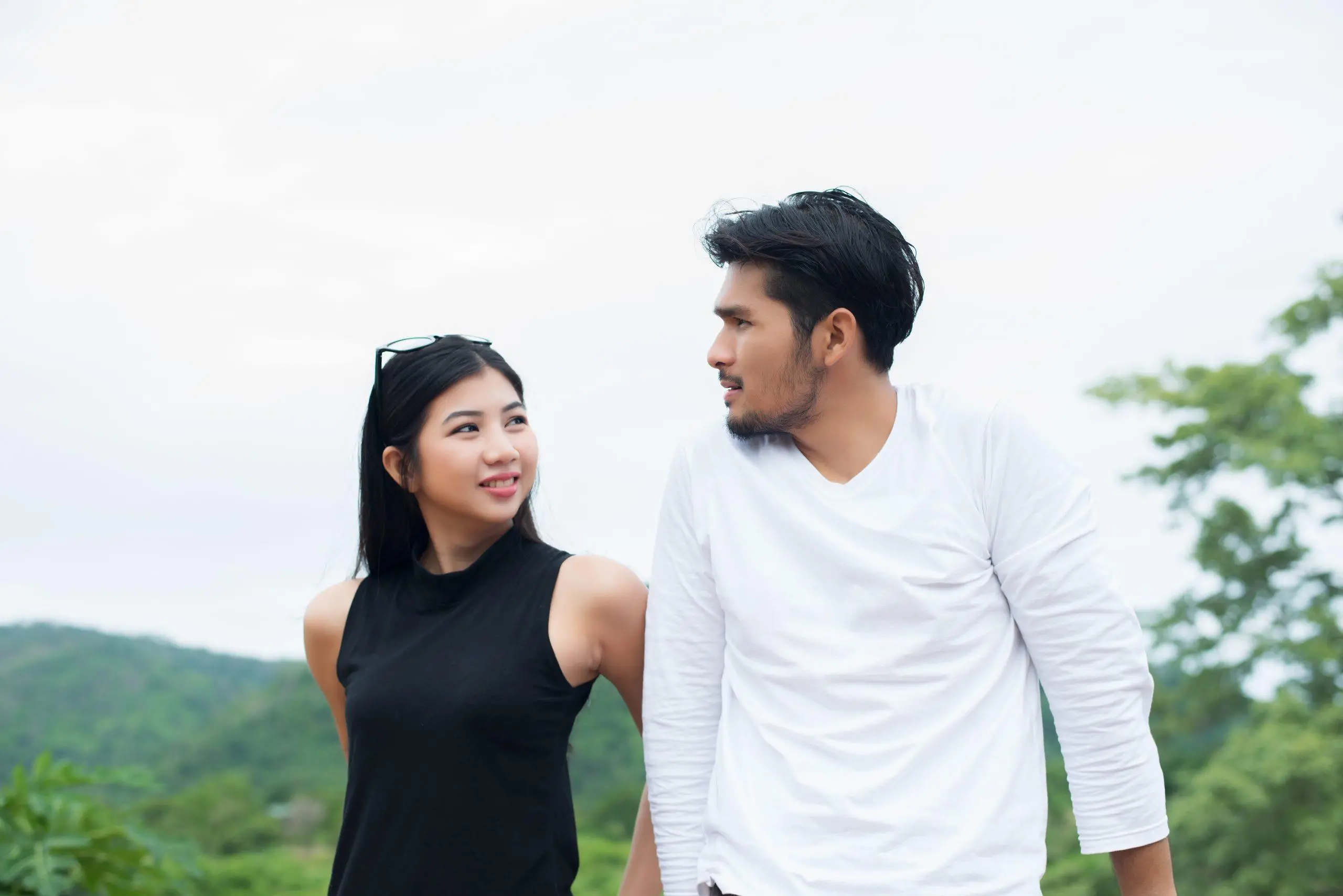 Portrait of an attractive woman seriously listening to her boyfriend while on a date,spend good time together.