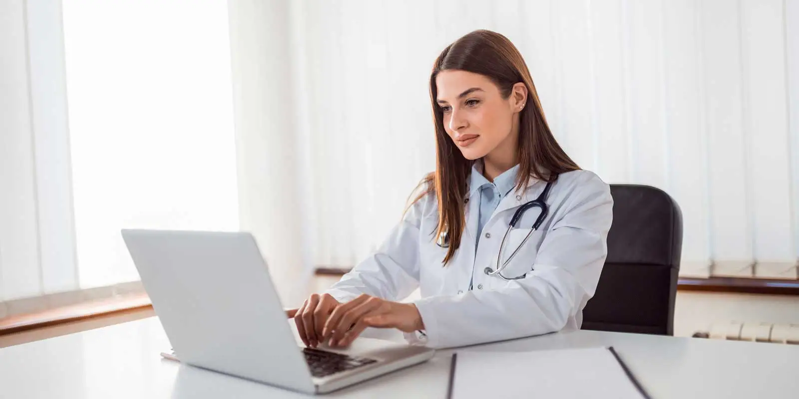 AdobeStock 264238246 female doctor laptop